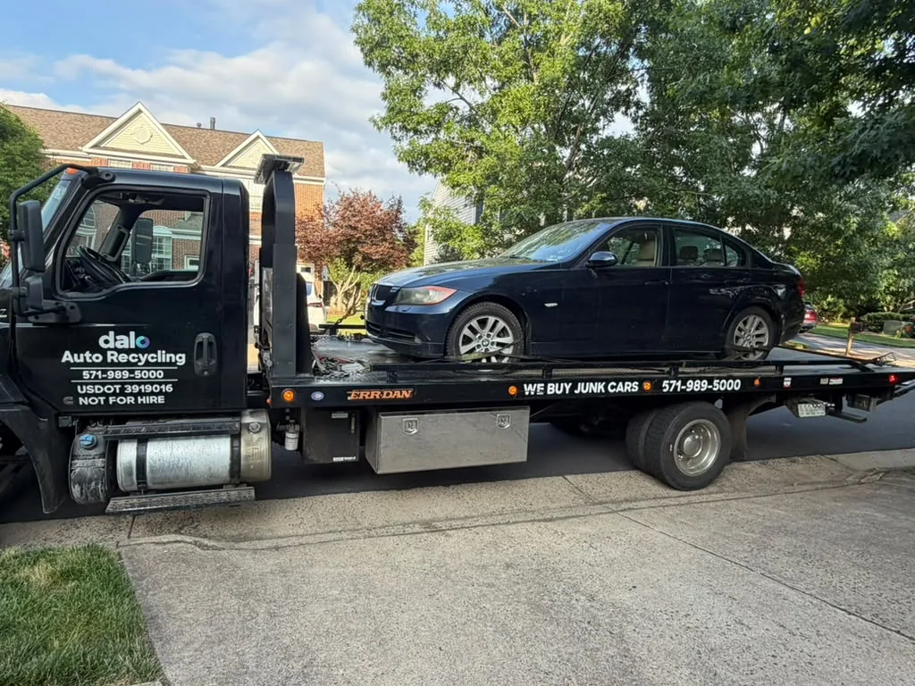 Sedan loaded for pickup in a Falls Church, VA townhome neighborhood by Dalo Auto Recycling