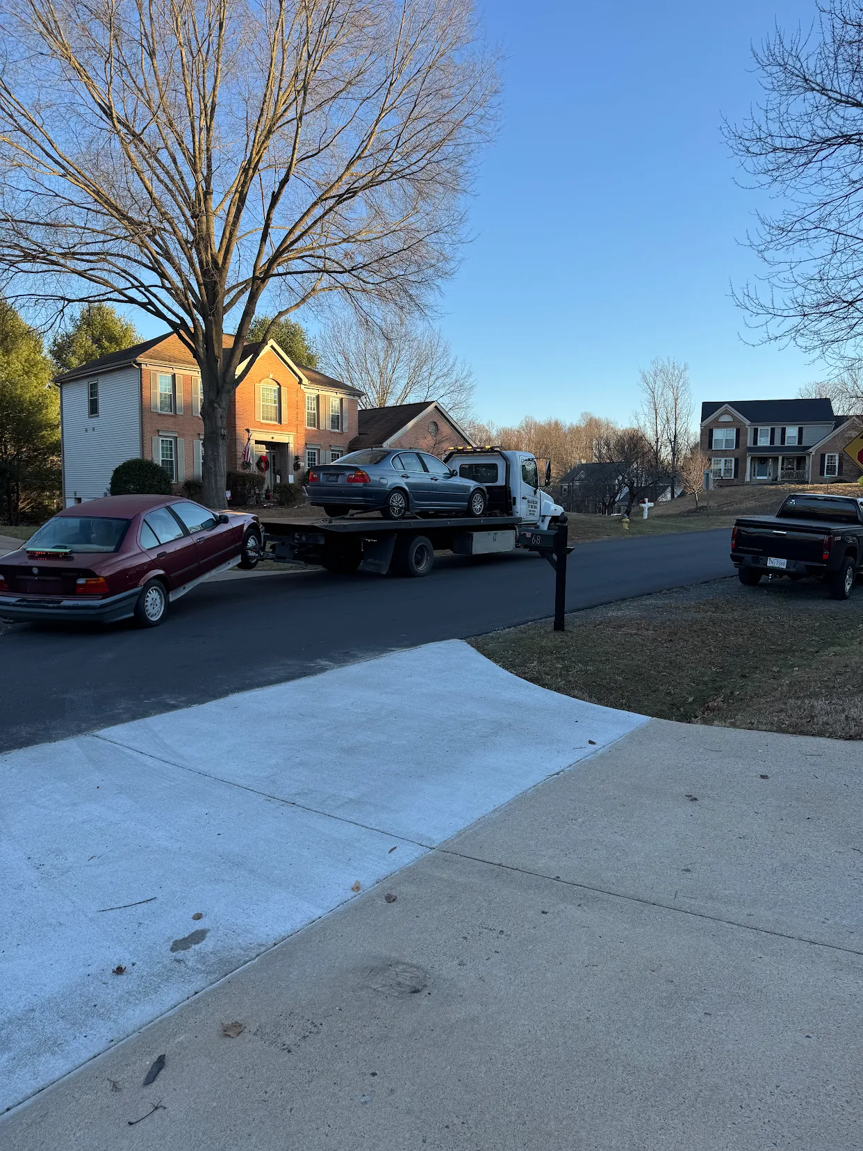 Residential neighborhood vehicle pickup in Oakton, VA by Dalo Auto Recycling