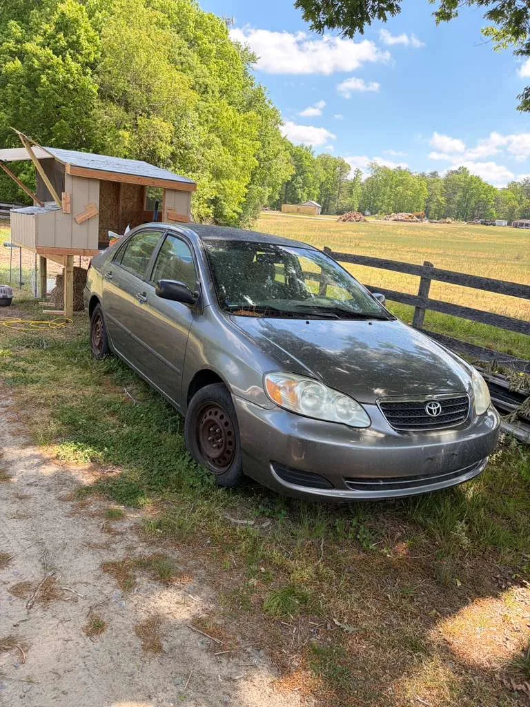 Older Toyota Corolla sitting unused on private property in Virginia