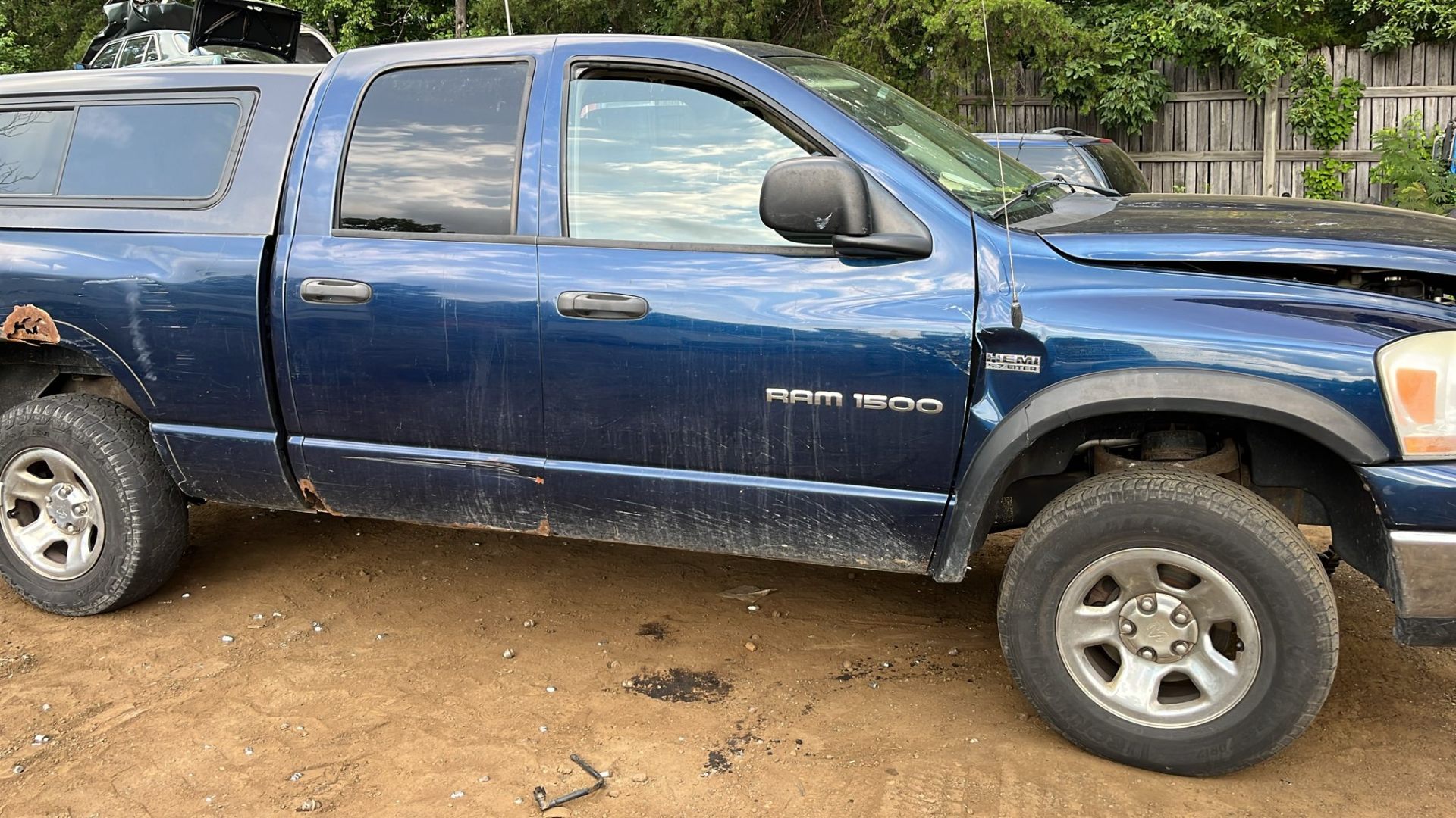 Older blue Dodge Ram truck waiting for junk car removal in Stafford, VA
